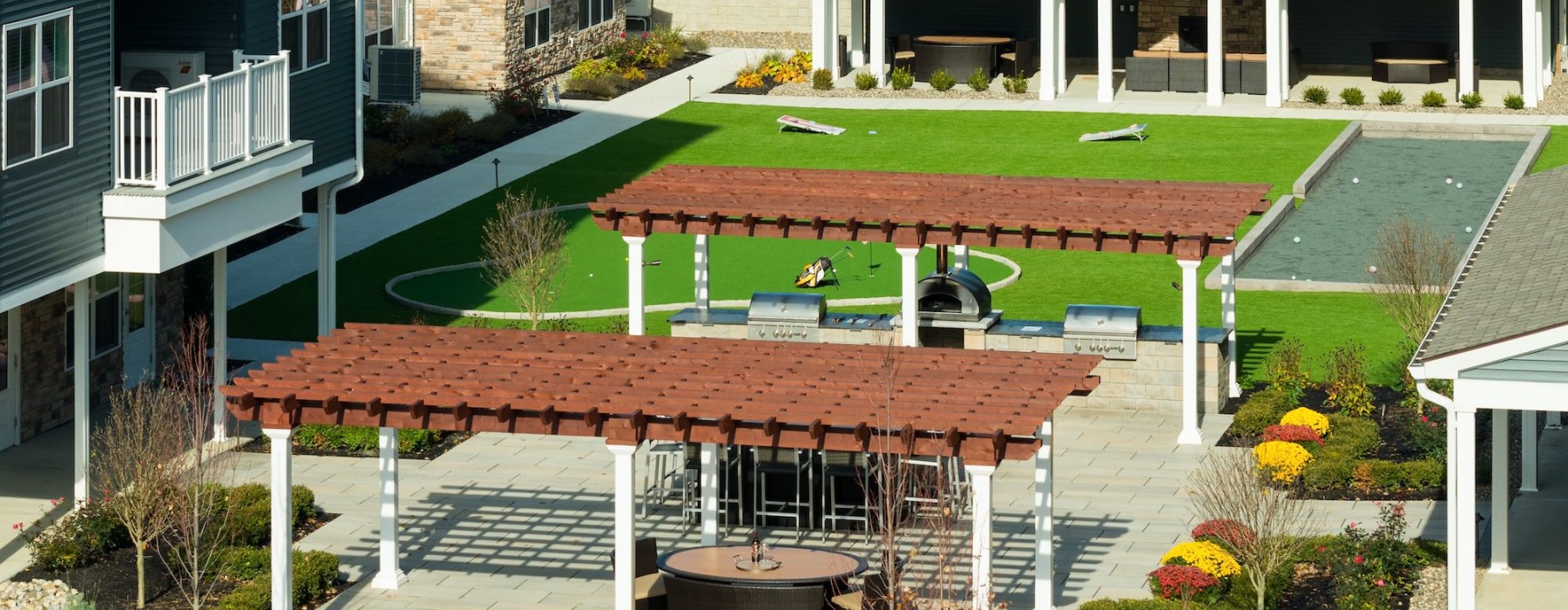 a grill area in the middle of a courtyard