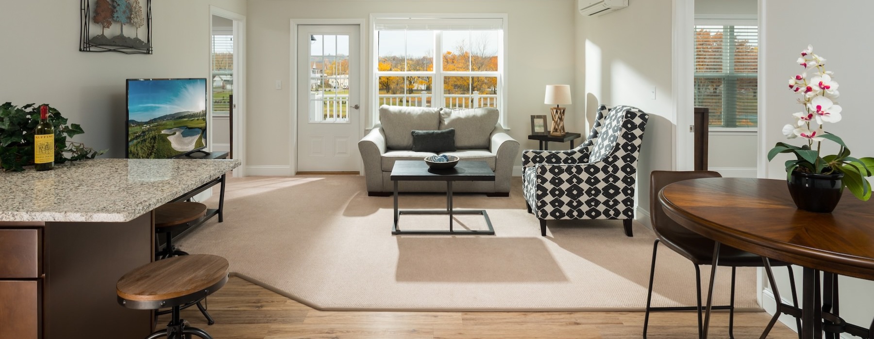 a living room with a couch and coffee table