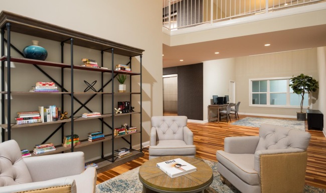 a clubhouse room with a book shelf